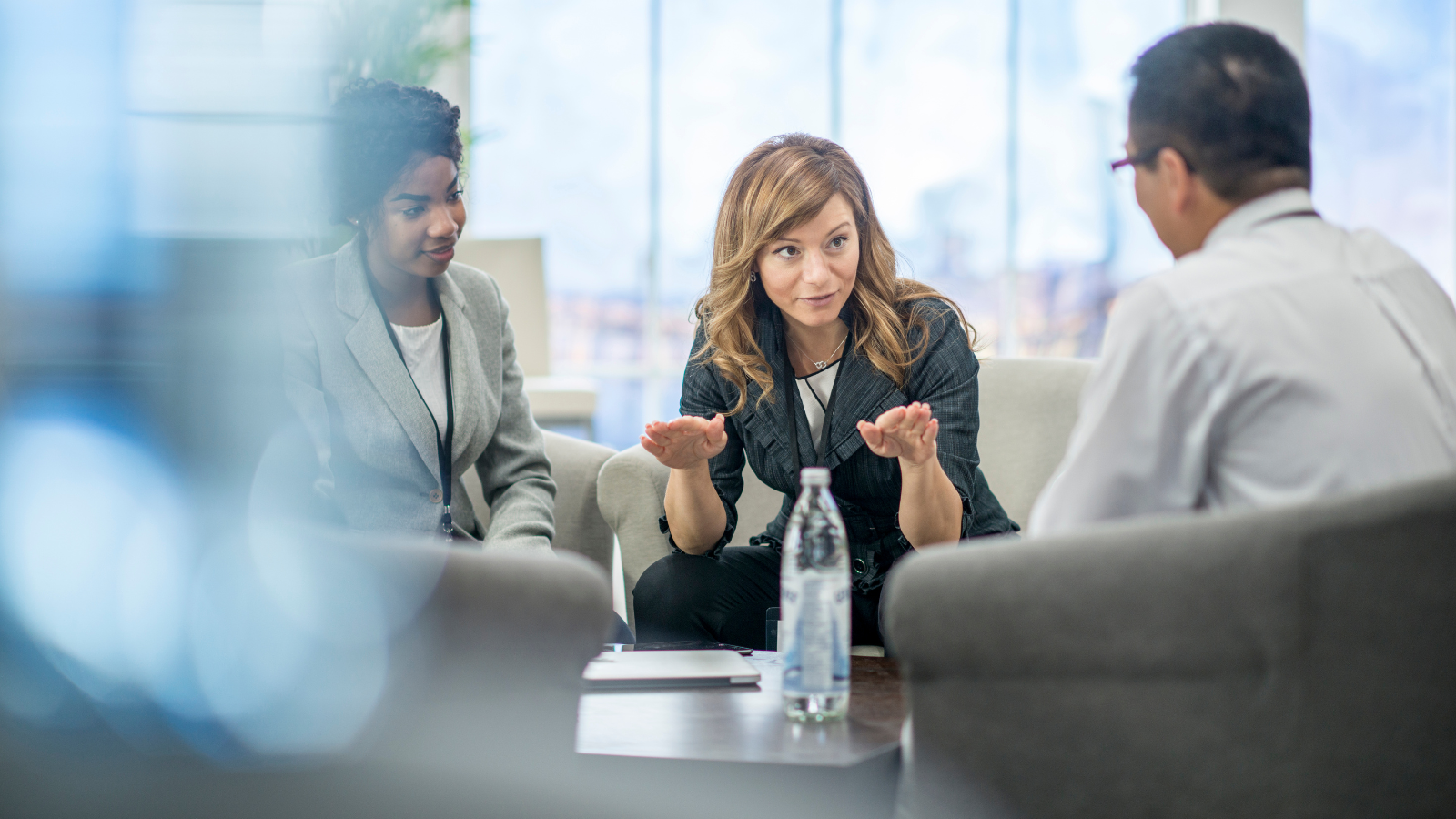 a woman team leader cultivating strengths in a team